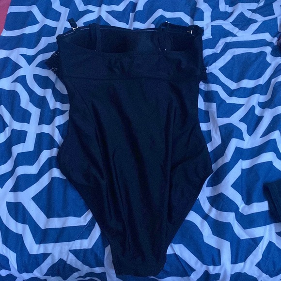 Black one piece. Size small - Picture 2 of 2